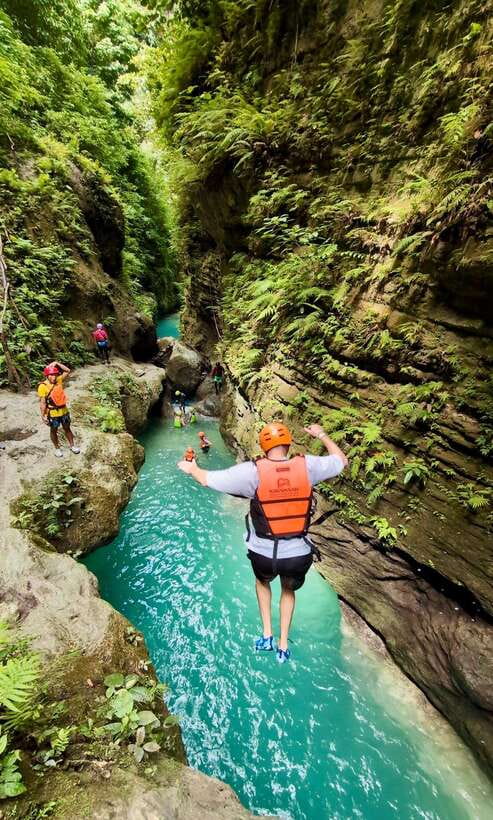 Cebu: Kawasan Canyoneering with Ziplining Adventure - Kawasan canyoneering: narrow gorges, cliff jumps, and real swim time