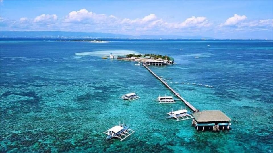Cebu: Mactan Island Hopping Boat Tour with Lunch - The river-boat segment: a quieter change of pace