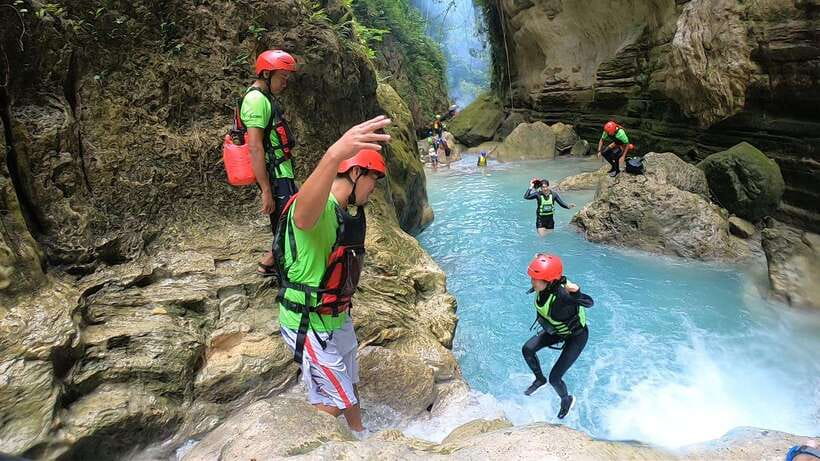 Cebu: Moalboal Sardines Run Snorkel & Kawasan Canyoneering - Canyoneering in Kawasan: jumps, slides, and safety in motion