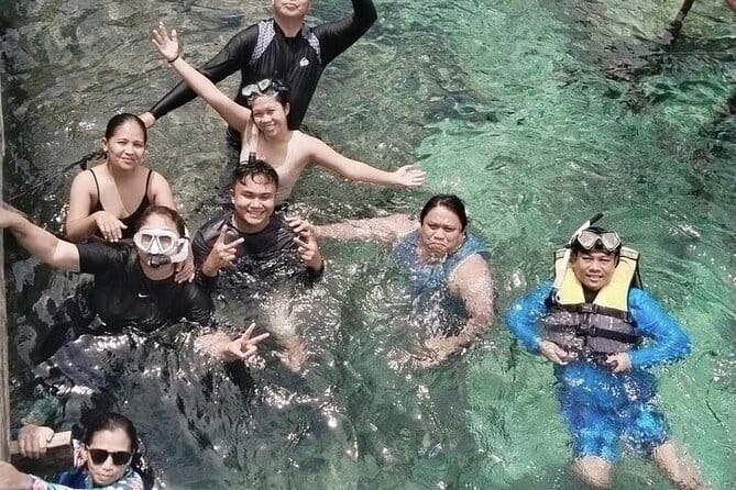 Cebu Private Tour 3 Islands Hopping Gilutungan Caohagan Nalusuan - Hilutungan Island snorkeling: corals, fish, and a guide who knows where to anchor