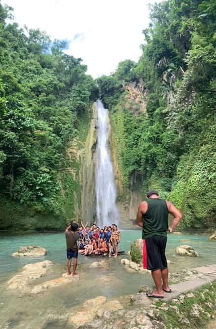 Cebu: Sardine Run Snorkeling, Mantayupan Falls & ATV Thrills - Mantayupan Falls swim under the waterfall