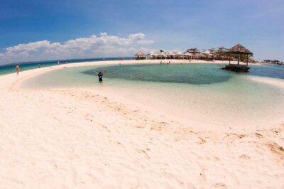 Mactan Cebu Island Hopping with Lunch - Gilutungan, Caohagan, Nalusuan - Caohagan Island: white sand break, reef views, and the reality of crowded water