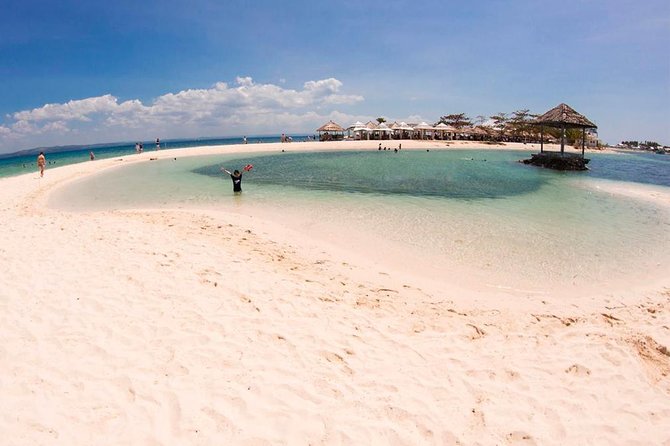 Mactan Cebu Island Hopping with Lunch - Gilutungan, Caohagan, Nalusuan - Caohagan Island: white sand break, reef views, and the reality of crowded water