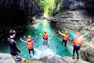 Oslob Whale Shark & Tumalog Falls & Kawasan Falls Canyoneering - Tumalog Falls: a refreshing stop with a small timing catch