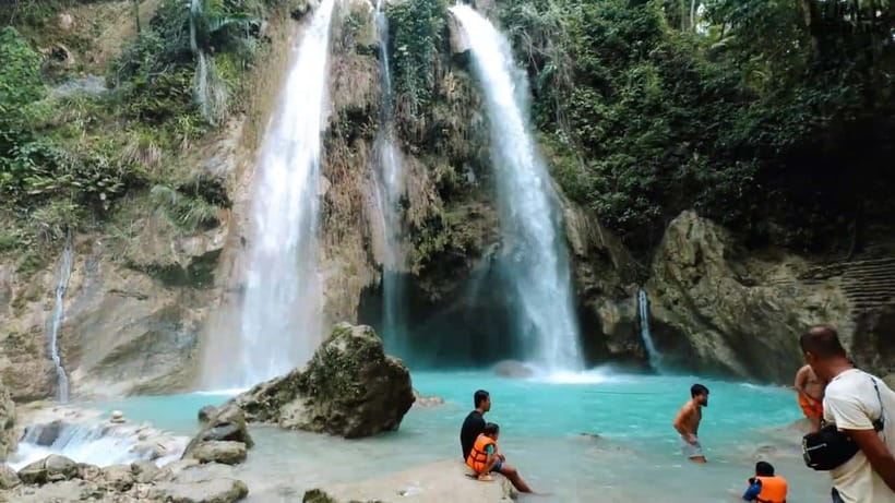 Oslob: Whaleshark Swimming, Inambakan Falls & Moalboal Tour - Entering Oslob at sunrise for whale sharks you can actually see