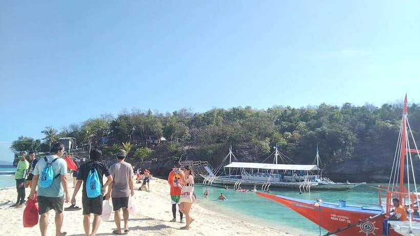 Oslob: Whaleshark Watching, Tumalog Falls & Sumilon Island - Sumilon Island sandbar time: tide rules, beach calm, and optional snorkeling